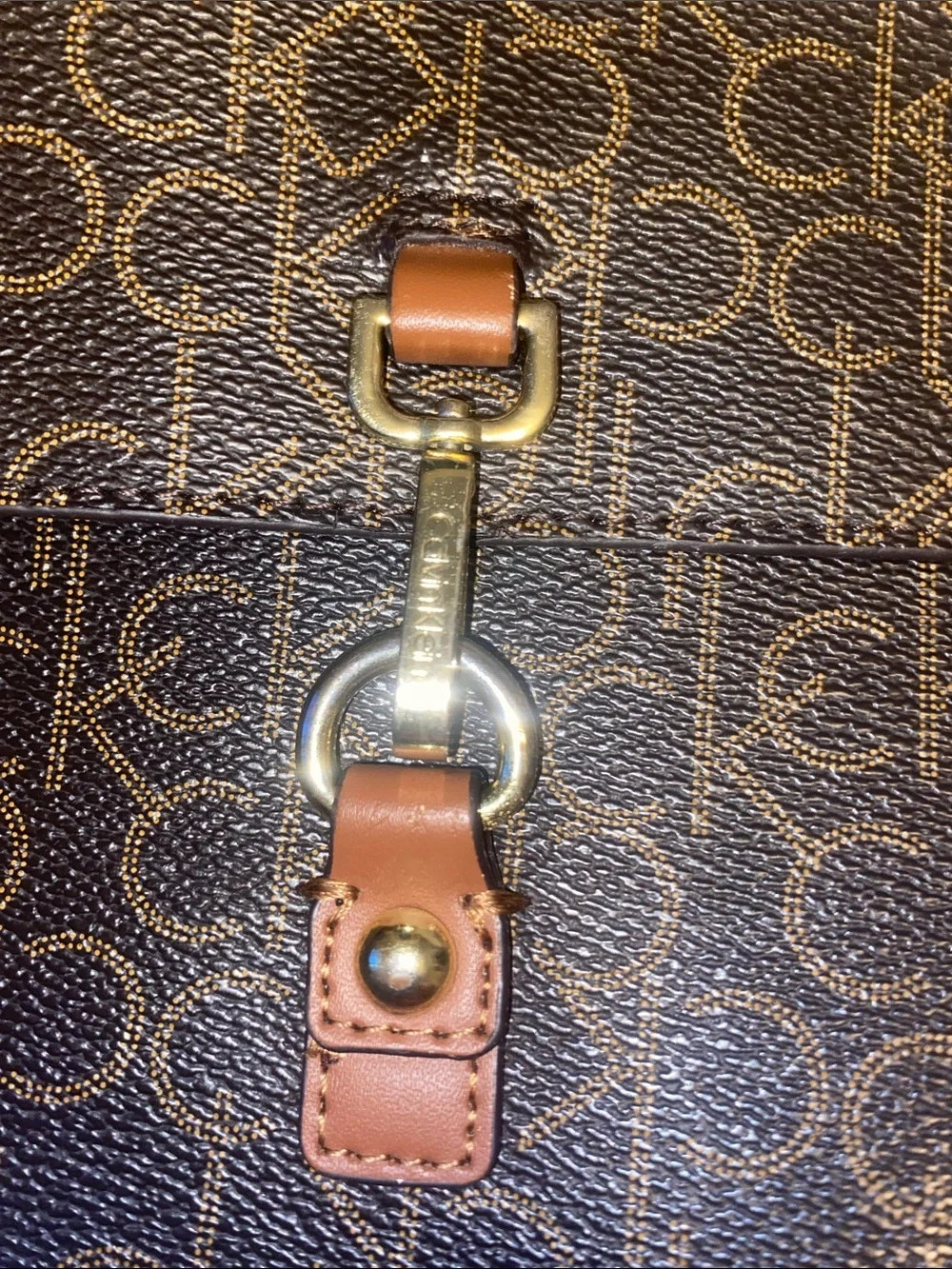 Calvin Klein Brown Monogram Crossbody Bag with Tan Leather Strap